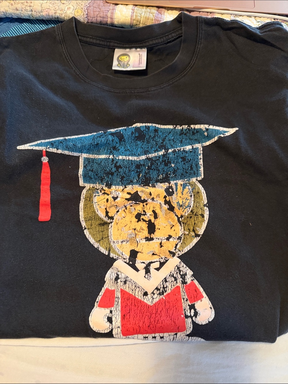 Black Short-Sleeve Graphic Tee with Blue Graduation Cap and Red Accents